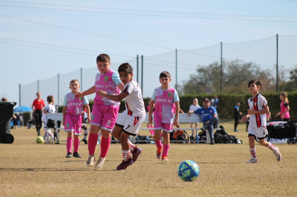 Dr. Phillips Soccer Club players competing in a youth match